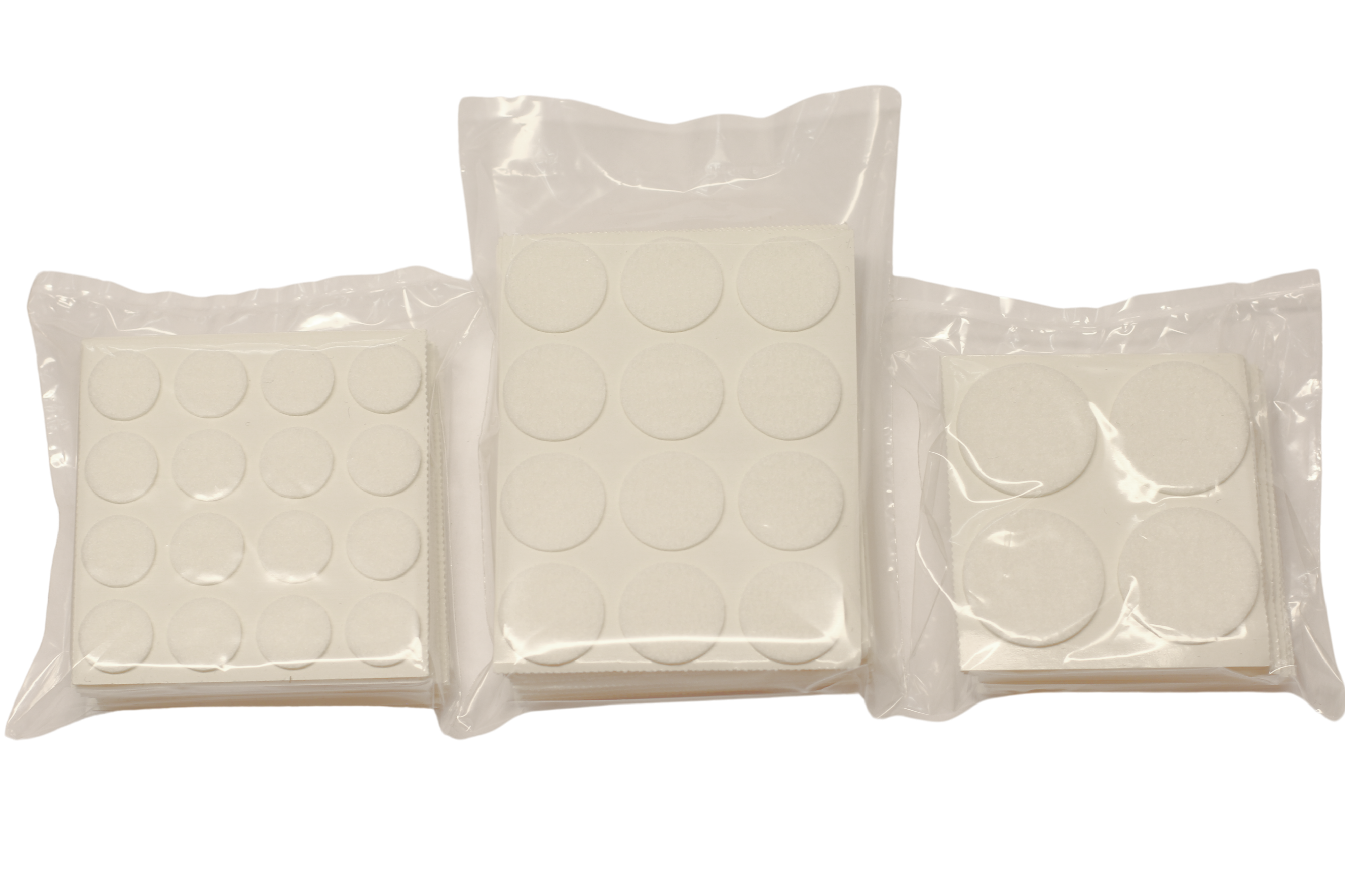 Självhäftande filtstorpack med runda filtbitar i olika storlekar.